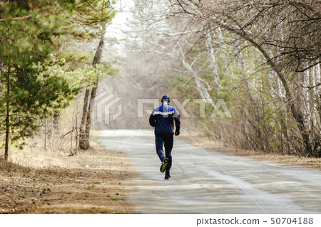 back man in tracksuit running back man in tracksuit running 50704188