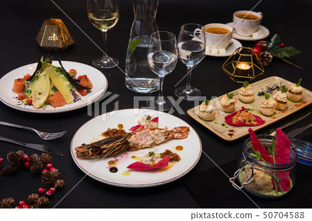 Tasty restaurant dishes Tasty restaurant dishes 50704588
