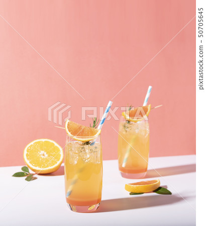Cold and refreshing orange punch cocktail Cold and refreshing orange punch cocktail 50705645