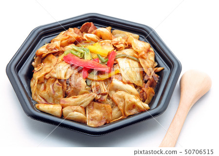 Rice cooker on rice dish 50706515