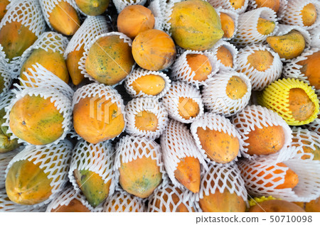 papaya fruit stacked on the marketplace 50710098