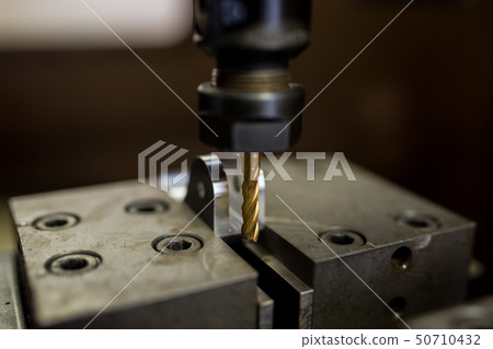 Part machining at machining center Part machining at machining center 50710432