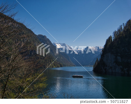 Boat on the Koenigssee in the national park Boat on the Koenigssee in the national park 50711827