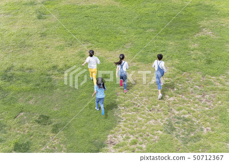 Many children running 50712367