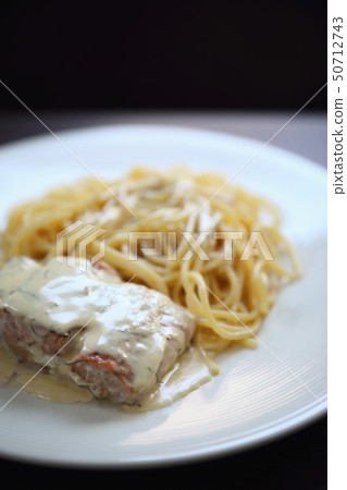 Grilled salmon with lemon cream sauce with pasta Grilled salmon with lemon cream sauce with pasta 50712743
