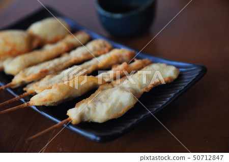 Kushikatsu Japanese fried on wooden table 50712847