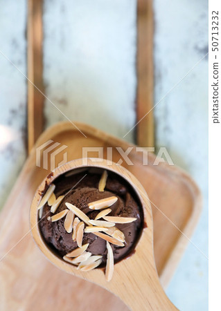 chocolate ice cream on wood background chocolate ice cream on wood background 50713232