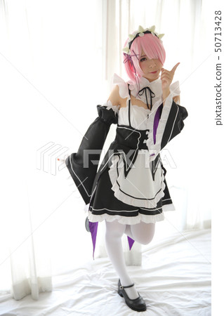 Portrait of Japan anime cosplay woman , white japanese maid in white tone room 50713428