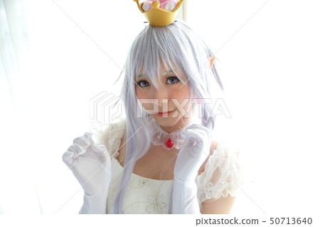 Portrait of vampire dracula young woman dress in white tone room halloween concept Portrait of vampire dracula young woman dress in white tone room halloween concept 50713640