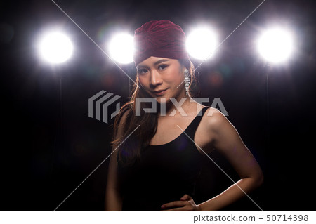 Fashion Asian Woman dark smoke back rim light Fashion Asian Woman dark smoke back rim light 50714398