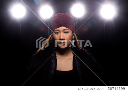Fashion Asian Woman dark smoke back rim light Fashion Asian Woman dark smoke back rim light 50714399
