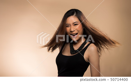 Fashion Asian Woman Tan skin black hair eyes Fashion Asian Woman Tan skin black hair eyes 50714400