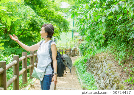Senior women traveling women going around 100 waterfalls in Japan 50714457