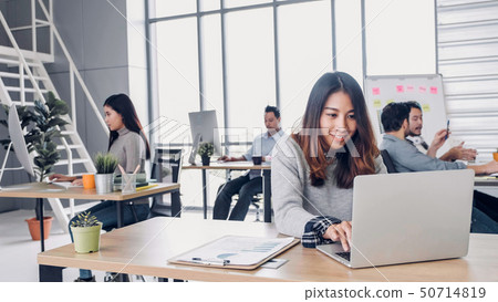 Group of diversity creative designer working at 50714819