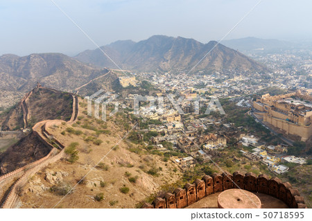 Ancient long wall with towers around Amber Fort, Ancient long wall with towers around Amber Fort, 50718595