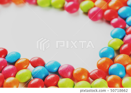 Frame of multi-colored candies close up. Rainbow 50718662