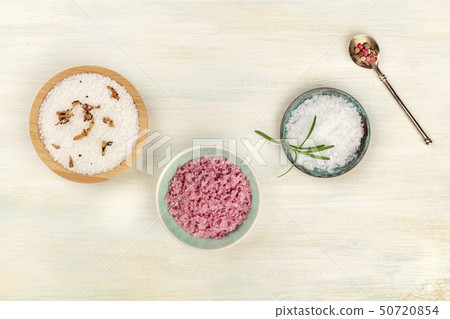 Gourmet spices. An overhead photo of various types of finishing salt and pepper, shot from the top 50720854