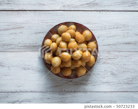 Luqaimat - traditional sweet dumplings of UAE. 50723233