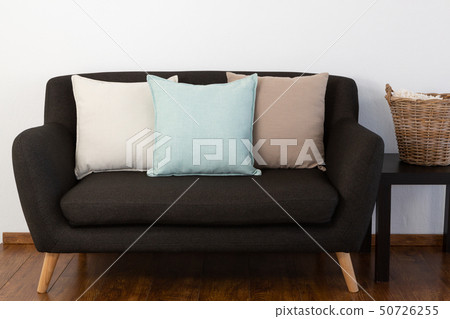 Cushions arranged on sofa Cushions arranged on sofa 50726255