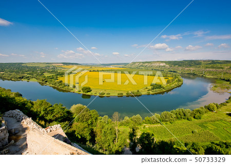 Beautiful view of nature. Blue sky, yelow field. Beautiful view of nature. Blue sky, yelow field. 50733329