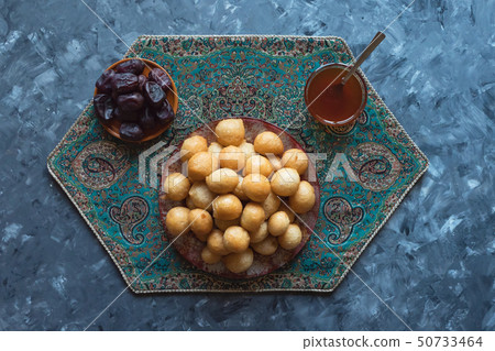 Luqaimat - traditional sweet dumplings of UAE. 50733464