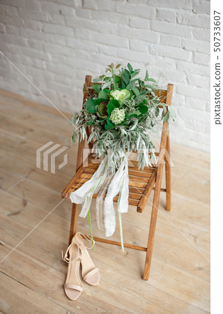 Wedding bride's wedding accessories. Flower ,shoes and chair. Wedding bride's wedding accessories. Flower ,shoes and chair. 50733607