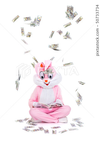 Hundred dollar bills money falls from sky. Lucky person under rain of dollars. Businessman is 50733734