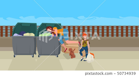 mother and daughter tramps searching food and clothes in trash can on street beggars family homeless 50734939