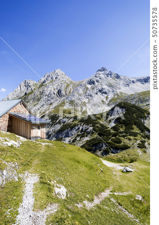 Hut at mountain lake Drachensee    50735578