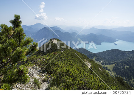 Summit cross at Herzogstand mountain in Bavaria Summit cross at Herzogstand mountain in Bavaria 50735724