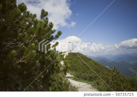 Summit cross at Herzogstand mountain in Bavaria Summit cross at Herzogstand mountain in Bavaria 50735725