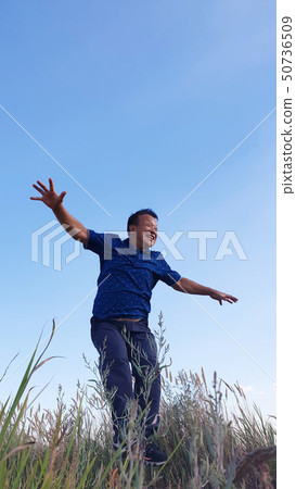 Father laughing laughing laughing father jumped open two arms 50736509