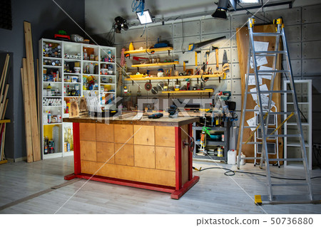 carpentry workshop equipped with the necessary tools carpentry workshop equipped with the necessary tools 50736880