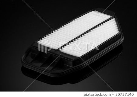 automobile filter on a black background 50737140