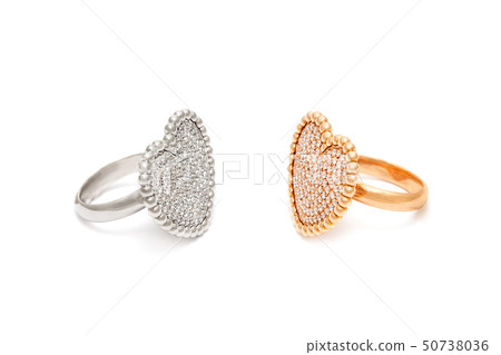 Diamond rings isolated on white background. Rings with diamonds in shape of heart. Luxury jewelry 50738036