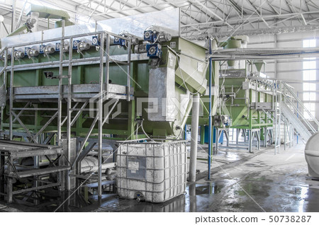 a plant for recycling bottles 50738287