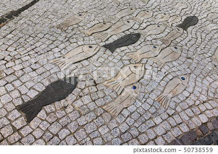 Fish paving stone in sardinian city Porto Rotondo, Italy Fish paving stone in sardinian city Porto Rotondo, Italy 50738559
