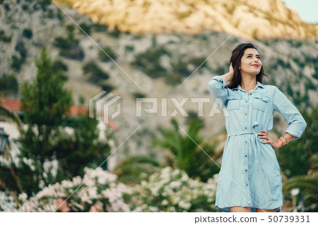 girl near flowers girl near flowers 50739331