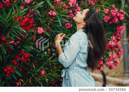 girl near flowers 50739366