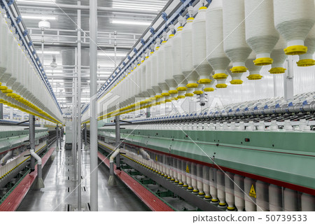 spools of thread at a textile factory 50739533