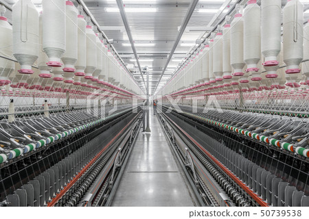 spools of thread at a textile factory spools of thread at a textile factory 50739538