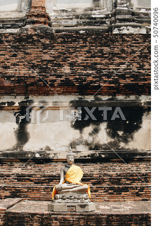 Ancient Buddha statues placed on brick walls. Ancient Buddha statues placed on brick walls. 50740096