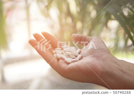 Group of Medicine pills in the hand. Group of Medicine pills in the hand. 50740288