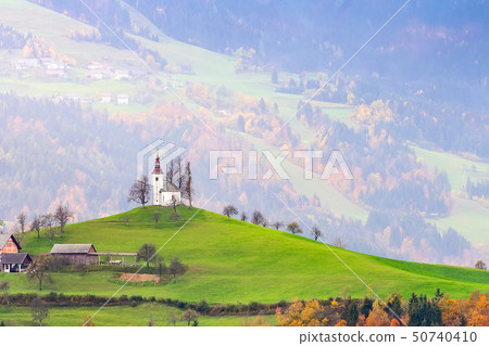 Church on top of the hill in Slovenia countryside Church on top of the hill in Slovenia countryside 50740410