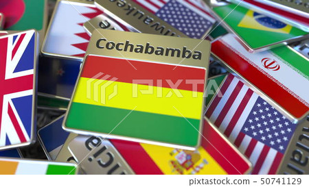 Souvenir magnet or badge with Cochabamba text and national flag among different ones. Traveling to 50741129