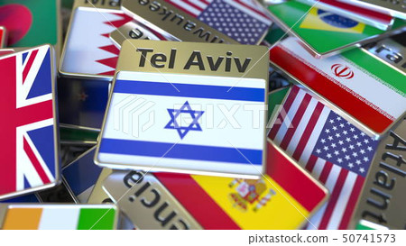Souvenir magnet or badge with Tel Aviv text and national flag among different ones. Traveling to 50741573