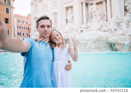Happy kid and dad enjoy their european vacation in Italy 50742138