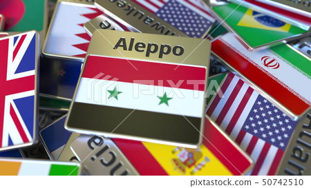 Souvenir magnet or badge with Aleppo text and national flag among different ones. Traveling to Syria 50742510