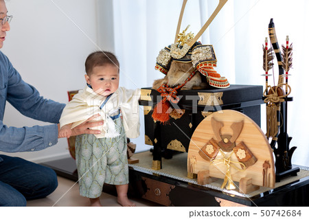 A boy celebrating the end of the season 50742684