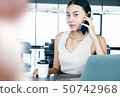 Businesswoman handling office management and lead  50742968